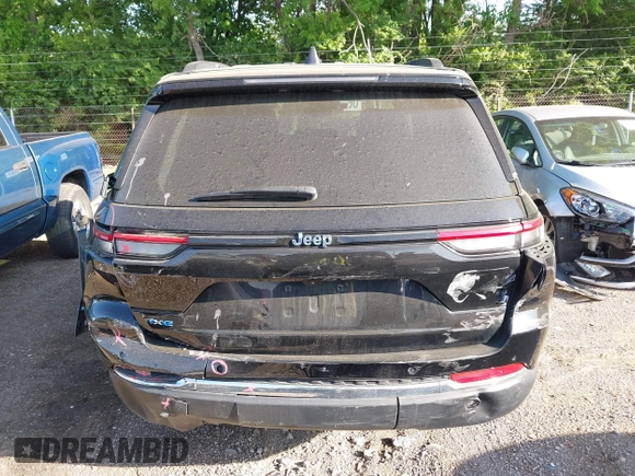 2023 Jeep Grand Cherokee with VIN 1C4RJYB68PC648859, listed as a IAAI auction lot 42267180 with 29,809 mi miles and . Bid and sale history available at DreamBid. Image 6.