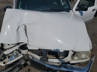 2005 Ford Ranger XLT z VIN 1FTZR45E65PA15867, wystawiony jako Copart lot #59501235 z przebiegiem Nie podano mil oraz Szkoda całkowita • Salvage title. Historia ofert i sprzedaży dostępna na DreamBid. Obrazek 11.