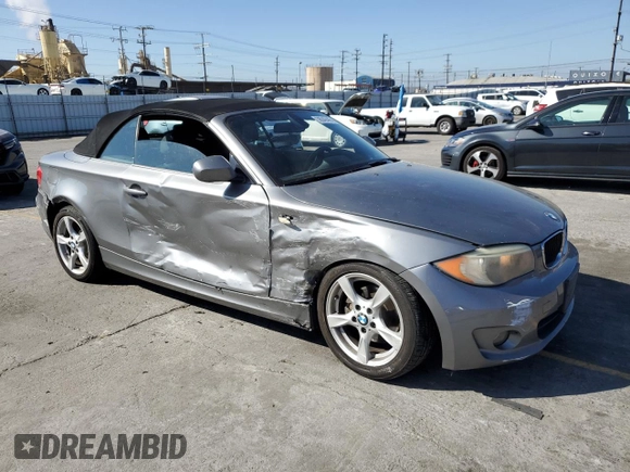 2012 BMW 1 Series 128i with VIN WBAUN1C5XCVR00151, listed as a Copart auction lot 56040445 with 171,302 mi miles and Salvage title. Bid and sale history available at DreamBid. Image 4.
