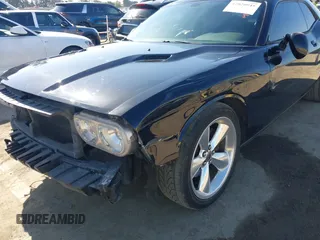 2014 Dodge Challenger R/T z VIN 2C3CDYBT2EH313789, wystawiony jako IAAI lot #42020945 z przebiegiem 182 788 mil mil oraz . Historia ofert i sprzedaży dostępna na DreamBid. Obrazek 6.