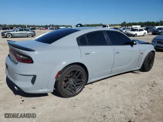 2022 Dodge Charger Scat Pack with VIN 2C3CDXGJ4NH222332, listed as a Copart auction lot 87069084 with 58,362 mi miles and Salvage Title. Bid and sale history available at carsss.com. Image 3.