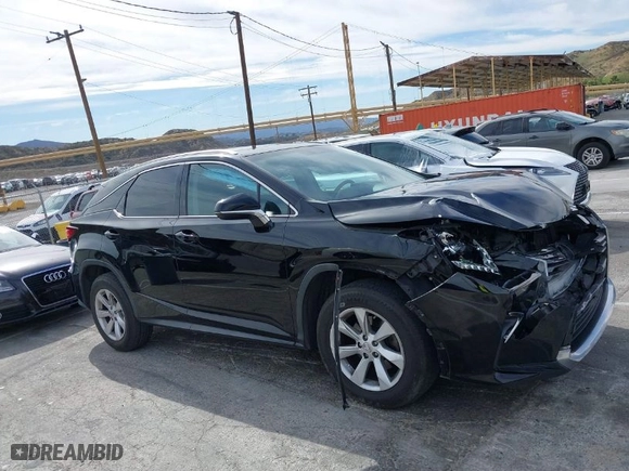2016 Lexus RX 350 with VIN 2T2ZZMCA7GC019908, listed as a IAAI auction lot 41670619 with NaN miles. Bid and sale history available at carsss.com. Image 13.