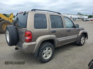 2002 Jeep Liberty Limited with VIN 1J4GL58K22W120496, listed as a Copart auction lot 62561875 with 161,388 mi miles and Salvage title. Bid and sale history available at DreamBid. Image 3.