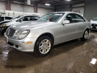 2003 Mercedes-Benz E-Class 3.2L with VIN WDBUF65JX3A294346, listed as a Copart auction lot 52371545 with 158,664 mi miles and Salvage Title. Bid and sale history available at carsss.com. Image 1.