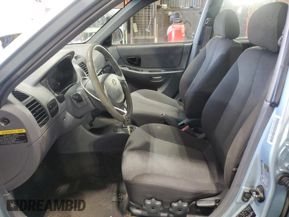 2005 Hyundai Accent GLS with VIN KMHCG45C15U602419, listed as a Copart auction lot 47759675 with 58,133 mi miles and Salvage Title. Bid and sale history available at carsss.com. Image 7.