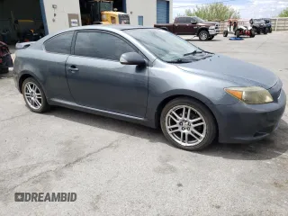 2006 Scion tC z VIN JTKDE177760077915, wystawiony jako Copart lot #60765164 z przebiegiem 152 483 mil mil oraz Szkoda całkowita • Salvage title. Historia ofert i sprzedaży dostępna na DreamBid. Obrazek 4.