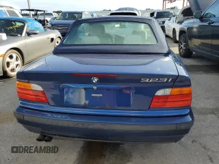 1999 BMW 3 Series 323ic with VIN WBABJ7334XEA65211, listed as a Copart auction lot 74319584 with 0 mi miles and Non Repairable. Bid and sale history available at carsss.com. Image 6.
