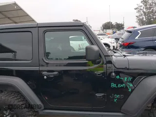 2021 Jeep Wrangler Sport with VIN 1C4GJXAN5MW627228, listed as a IAAI auction lot 42170010 with 56,965 mi miles and . Bid and sale history available at DreamBid. Image 13.