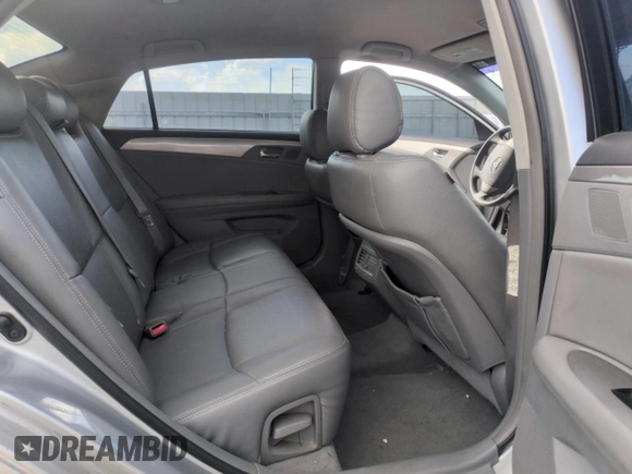 2007 Toyota Avalon XL z VIN 4T1BK36B17U195702, wystawiony jako Copart lot #58081355 z przebiegiem Nie podano mil oraz Szkoda całkowita • Salvage title. Historia ofert i sprzedaży dostępna na DreamBid. Obrazek 10.