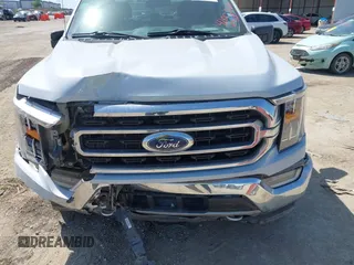 2021 Ford F-150 XL z VIN 1FTFW1E86MKD90402, wystawiony jako IAAI lot #42007680 z przebiegiem 103 724 mil mil oraz . Historia ofert i sprzedaży dostępna na DreamBid. Obrazek 6.