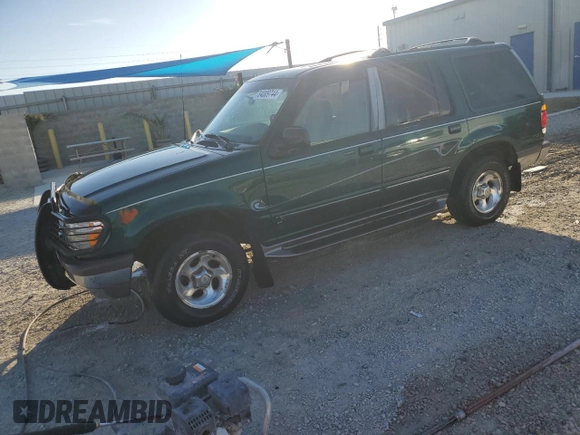 1997 Ford Explorer XL with VIN 1FMDU34E5VZB40878, listed as a Copart auction lot 84009744 with 185,047 mi miles and Salvage title. Bid and sale history available at DreamBid. Image 1.
