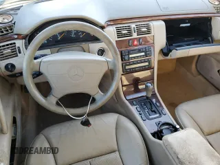1998 Mercedes-Benz E-Class with VIN WDBJH65F9WA597132, listed as a Copart auction lot 77780094 with 0 mi miles and Salvage Title. Bid and sale history available at carsss.com. Image 8.