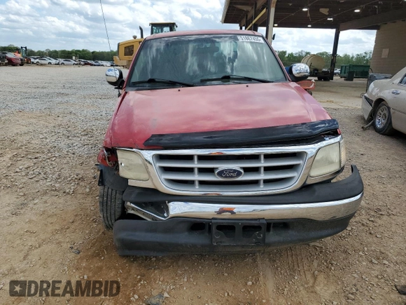 1999 Ford F-150 with VIN 1FTZX1725XNA33332, listed as a Copart auction lot 51867455 with 163,023 mi miles and Salvage title. Bid and sale history available at DreamBid. Image 5.