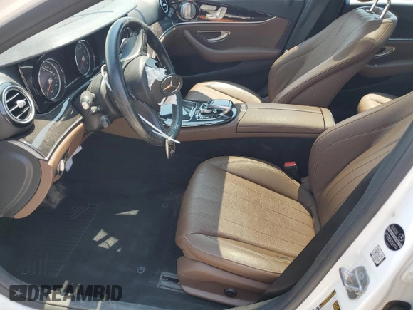 2017 Mercedes-Benz E 300 Luxury with VIN WDDZF4KB2HA061308, listed as a Copart auction lot 60214295 with 97,317 mi miles and Salvage title. Bid and sale history available at DreamBid. Image 7.