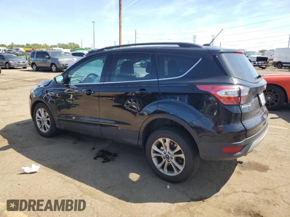 2017 Ford Escape SE z VIN 1FMCU0GD5HUD52467, wystawiony jako Copart lot #70616944 z przebiegiem 115 876 mil mil oraz Szkoda całkowita • Salvage title. Historia ofert i sprzedaży dostępna na DreamBid. Obrazek 2.
