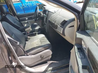 2010 Chrysler Town & Country Touring with VIN 2A4RR5DXXAR290623, listed as a IAAI auction lot 42103151 with 234,021 mi miles. Bid and sale history available at carsss.com. Image 5.
