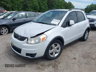 2012 Suzuki SX4 Crossover z VIN JS2YB5A35C6304967, wystawiony jako IAAI lot #42282088 z przebiegiem 152 232 mil mil oraz . Historia ofert i sprzedaży dostępna na DreamBid. Obrazek 2.