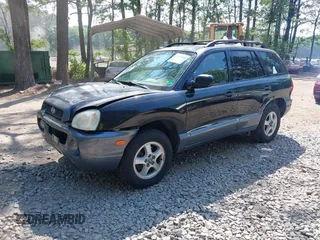 2004 Hyundai Santa Fe GLS z VIN KM8SC73DX4U610845, wystawiony jako IAAI lot #42224206 z przebiegiem 163 179 mil mil oraz . Historia ofert i sprzedaży dostępna na DreamBid. Obrazek 2.