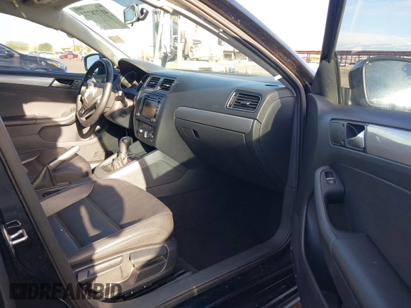 2015 Volkswagen Jetta Sedan 1.8T SE with VIN 3VWD17AJ9FM341950, listed as a IAAI auction lot 41778772 with 121,954 mi miles. Bid and sale history available at carsss.com. Image 5.