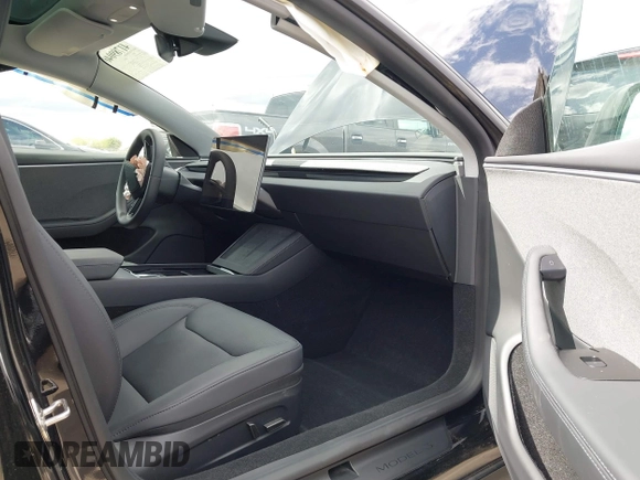 2024 Tesla Model 3 with VIN 5YJ3E1EA1RF831561, listed as a IAAI auction lot 41789046 with 13,603 mi miles. Bid and sale history available at carsss.com. Image 5.