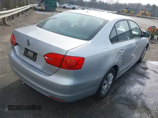 2014 Volkswagen Jetta S with VIN 3VW2K7AJ7EM313535, listed as a IAAI auction lot 41786112 with 63,694 mi miles and . Bid and sale history available at DreamBid. Image 4.