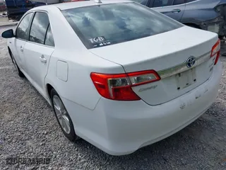 2012 Toyota Camry Hybrid XLE with VIN 4T1BD1FKXCU030157, listed as a IAAI auction lot 42040131 with 237,412 mi miles. Bid and sale history available at carsss.com. Image 3.