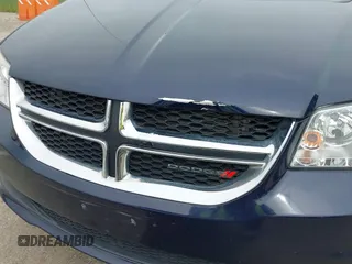 2015 Dodge Grand Caravan SXT with VIN 2C4RDGCG7FR524712, listed as a IAAI auction lot 41956063 with 111,144 mi miles and . Bid and sale history available at DreamBid. Image 18.