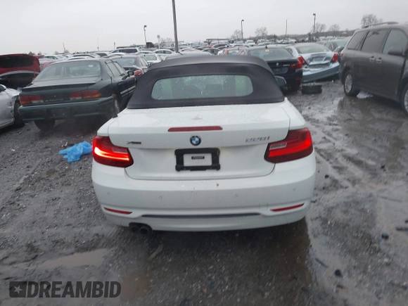2016 BMW 2 Series 228i xDrive with VIN WBA1L9C59GV767802, listed as a IAAI auction lot 41132997 with 87,674 mi miles. Bid and sale history available at carsss.com. Image 15.