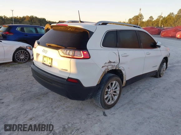 2019 Jeep Cherokee Latitude with VIN 1C4PJLCB1KD128463, listed as a IAAI auction lot 41813221 with 158,792 mi miles and . Bid and sale history available at carsss.com. Image 4.