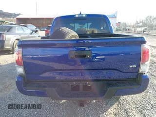 2023 Toyota Tacoma 4WD SR with VIN 3TYCZ5AN1PT119133, listed as a IAAI auction lot 41574906 with 19,887 mi miles. Bid and sale history available at carsss.com. Image 15.