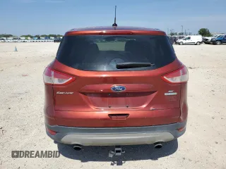 2016 Ford Escape SE z VIN 1FMCU0GX5GUC57593, wystawiony jako Copart lot #56365425 z przebiegiem 121 471 mil mil oraz Szkoda całkowita • Salvage title. Historia ofert i sprzedaży dostępna na DreamBid. Obrazek 6.