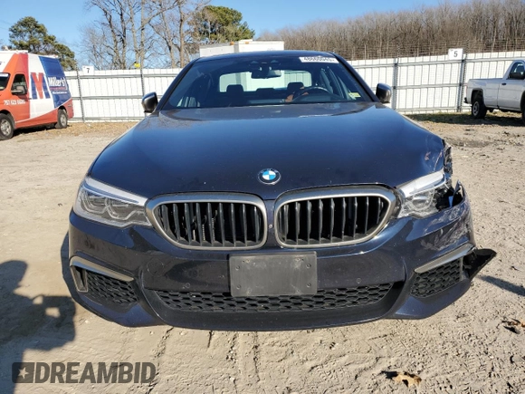 2020 BMW 5 Series M550i xDrive with VIN WBAJS7C0XLCE44248, listed as a Copart auction lot 48660045 with 73,949 mi miles and Salvage title. Bid and sale history available at DreamBid. Image 5.