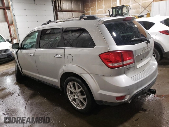 2013 Dodge Journey R/T with VIN 3C4PDDFG8DT621087, listed as a Copart auction lot 83105834 with 156,172 mi miles and Salvage title. Bid and sale history available at DreamBid. Image 2.