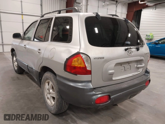 2004 Hyundai Santa Fe GLS with VIN KM8SC73D44U757341, listed as a IAAI auction lot 42254675 with 237,770 mi miles and . Bid and sale history available at DreamBid. Image 3.
