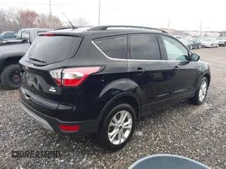 2017 Ford Escape SE with VIN 1FMCU0GD0HUD45409, listed as a IAAI auction lot 41859352 with 52,984 mi miles. Bid and sale history available at carsss.com. Image 4.