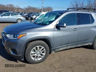 2021 Chevrolet Traverse LT Cloth with VIN 1GNEVGKW2MJ146411, listed as a IAAI auction lot 41694651 with 57,673 mi miles. Bid and sale history available at carsss.com. Image 18.