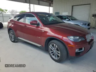 2014 BMW X6 50i z VIN 5UXFG8C58EL592408, wystawiony jako Copart lot #58175225 z przebiegiem 119 939 mil mil oraz Czysty tytuł • Clean title. Historia ofert i sprzedaży dostępna na DreamBid. Obrazek 4.