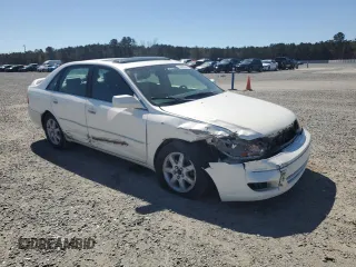 2002 Toyota Avalon XL z VIN 4T1BF28BX2U250961, wystawiony jako Copart lot #50400245 z przebiegiem 351 091 mil mil oraz Szkoda całkowita • Salvage title. Historia ofert i sprzedaży dostępna na DreamBid. Obrazek 4.