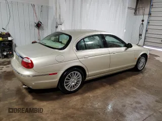 2006 Jaguar S-Type 3 z VIN SAJWA01A96FN53736, wystawiony jako Copart lot #52300005 z przebiegiem 68 472 mil mil oraz Szkody całkowita. Historia ofert i sprzedaży dostępna na DreamBid. Obrazek 3.