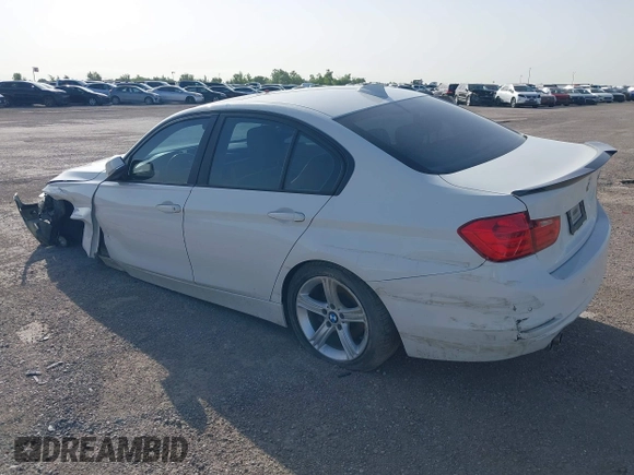 2014 BMW 3 Series 328i with VIN WBA3A5G5XENP32345, listed as a IAAI auction lot 42303835 with 100,235 mi miles and . Bid and sale history available at DreamBid. Image 3.