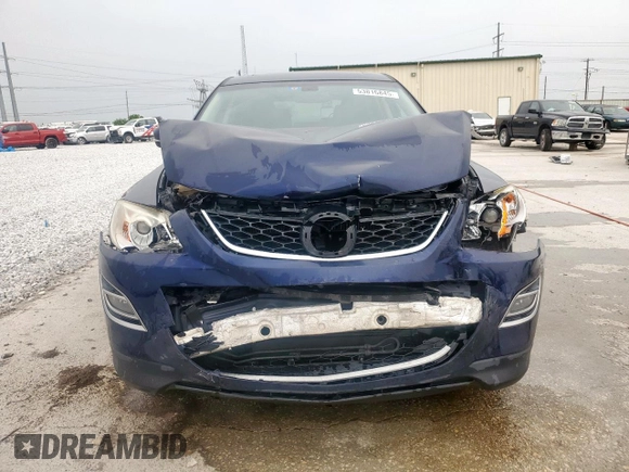 2012 Mazda CX-9 Grand Touring z VIN JM3TB2DA4C0359028, wystawiony jako Copart lot #53816845 z przebiegiem 148 848 mil mil oraz Szkoda całkowita • Salvage title. Historia ofert i sprzedaży dostępna na DreamBid. Obrazek 5.
