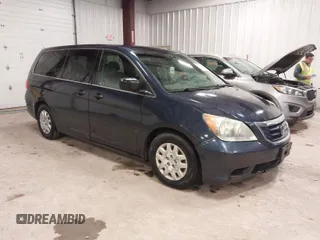 2009 Honda Odyssey LX z VIN 5FNRL38229B042383, wystawiony jako IAAI lot #42080457 z przebiegiem 195 653 mil mil oraz . Historia ofert i sprzedaży dostępna na DreamBid. Obrazek 1.