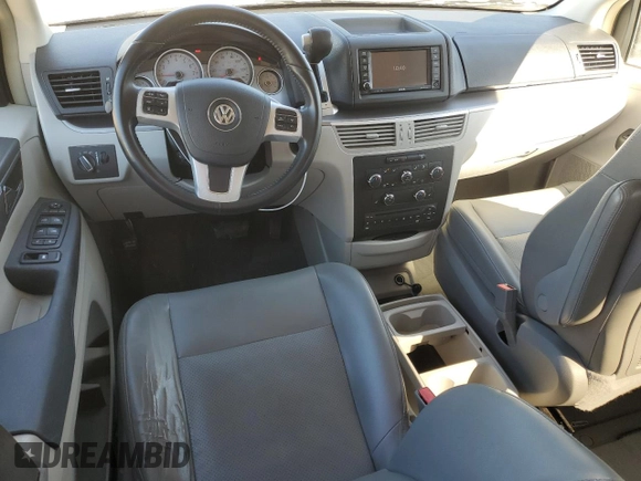 2014 Volkswagen Routan SE with VIN 2C4RVABG9ER135273, listed as a Copart auction lot 45343575 with 94,528 mi miles and Salvage title. Bid and sale history available at DreamBid. Image 8.