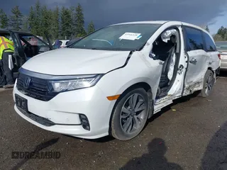 2021 Honda Odyssey Touring with VIN 5FNRL6H87MB015310, listed as a IAAI auction lot 41916339 with 58,808 mi miles. Bid and sale history available at carsss.com. Image 2.