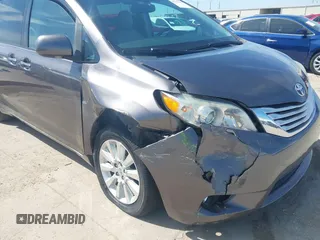 2011 Toyota Sienna XLE with VIN 5TDDK3DC7BS003186, listed as a IAAI auction lot 41701839 with 165,878 mi miles. Bid and sale history available at carsss.com. Image 6.