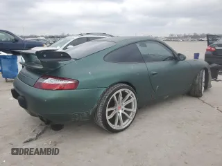 1999 Porsche 911 z VIN WP0AA299XXS623462, wystawiony jako Copart lot #85549554 z przebiegiem Nie podano mil oraz Szkoda całkowita • Salvage title. Historia ofert i sprzedaży dostępna na DreamBid. Obrazek 3.