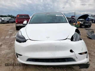 2024 Tesla Model Y Performance z VIN 7SAYGDEF0RA266605, wystawiony jako Copart lot #57820905 z przebiegiem Nie podano mil oraz Szkoda całkowita • Salvage title. Historia ofert i sprzedaży dostępna na DreamBid. Obrazek 5.