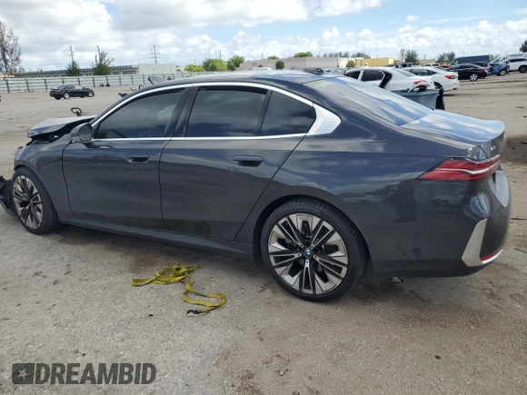 2024 BMW 5 Series 540i xDrive with VIN WBA63FJ0XRCR17779, listed as a Copart auction lot 69214264 with 2,023 mi miles and Salvage Title. Bid and sale history available at carsss.com. Image 2.