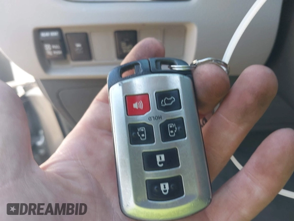 2015 Toyota Sienna XLE with VIN 5TDYK3DC0FS558486, listed as a IAAI auction lot 42064281 with 211,119 mi miles and . Bid and sale history available at DreamBid. Image 11.