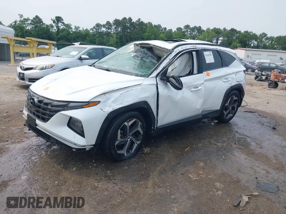 2022 Hyundai Tucson SEL z VIN 5NMJC3AE3NH057663, wystawiony jako IAAI lot #42428386 z przebiegiem 78 740 mil mil oraz . Historia ofert i sprzedaży dostępna na DreamBid. Obrazek 2.